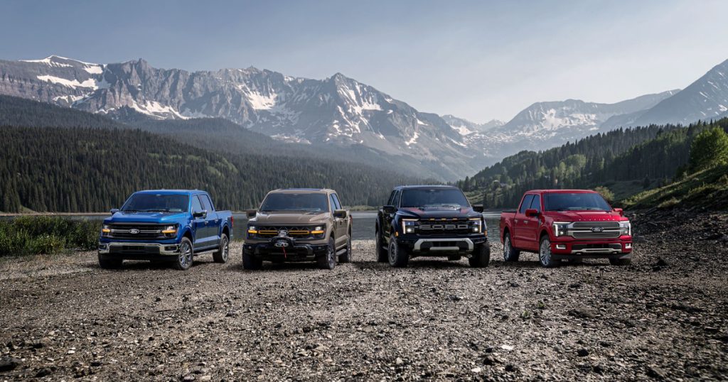 The new Ford lineup of trucks is pictured with a mountain range behind them. Shop for your new Ford truck near Charleston at Summerville Ford.