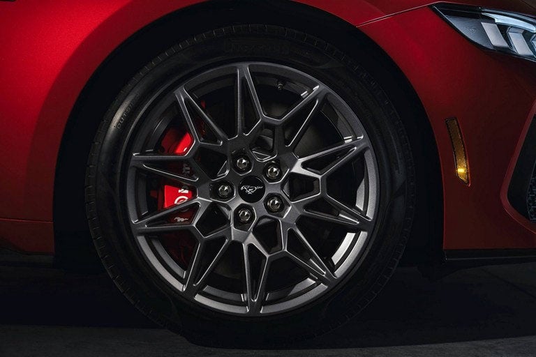2024 Ford Mustang® model with a close-up of a wheel and brake caliper | Summerville Ford in Summerville SC